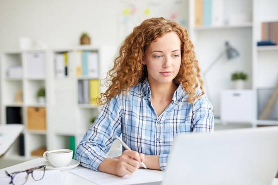 A person sitting at a table

Description automatically generated with medium confidence